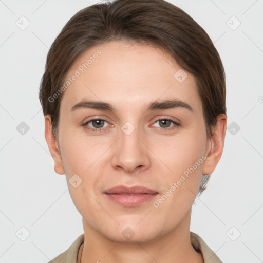 Joyful white young-adult female with short  brown hair and brown eyes