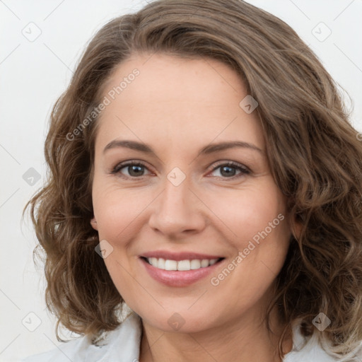 Joyful white young-adult female with medium  brown hair and green eyes