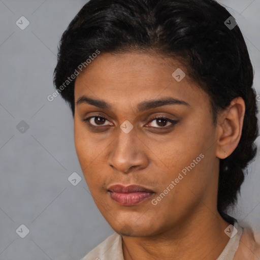 Joyful latino young-adult female with short  brown hair and brown eyes