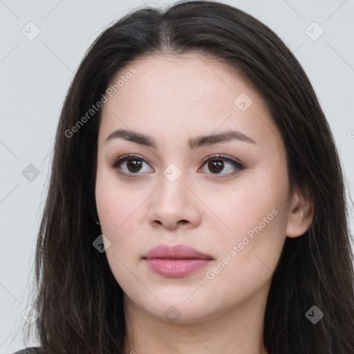 Joyful asian young-adult female with long  brown hair and brown eyes