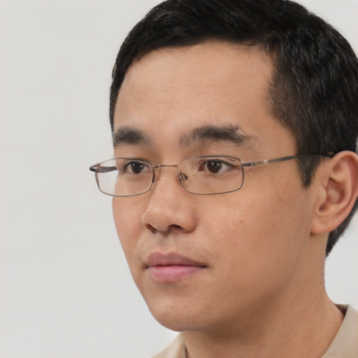 Neutral asian young-adult male with short  black hair and brown eyes