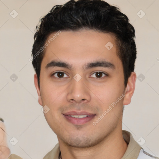 Joyful latino young-adult male with short  black hair and brown eyes