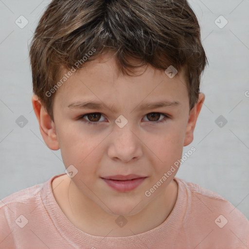 Joyful white child male with short  brown hair and brown eyes