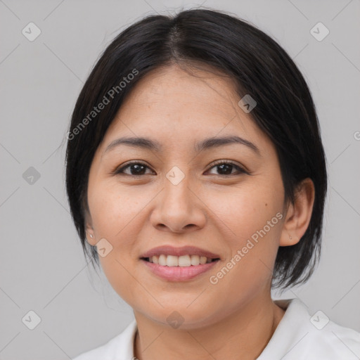 Joyful asian young-adult female with medium  black hair and brown eyes