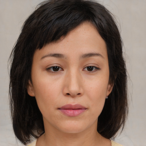 Neutral asian young-adult female with medium  brown hair and brown eyes