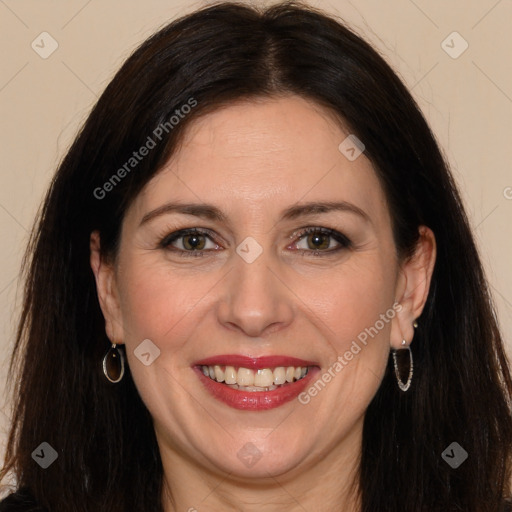 Joyful white adult female with long  brown hair and brown eyes