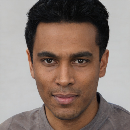 Neutral latino young-adult male with short  black hair and brown eyes