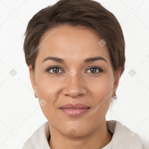 Joyful white adult female with short  brown hair and brown eyes