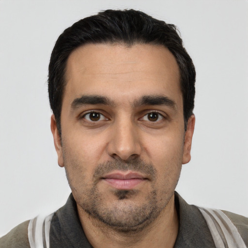 Neutral white young-adult male with short  black hair and brown eyes