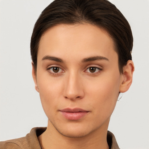 Neutral white young-adult female with short  brown hair and brown eyes