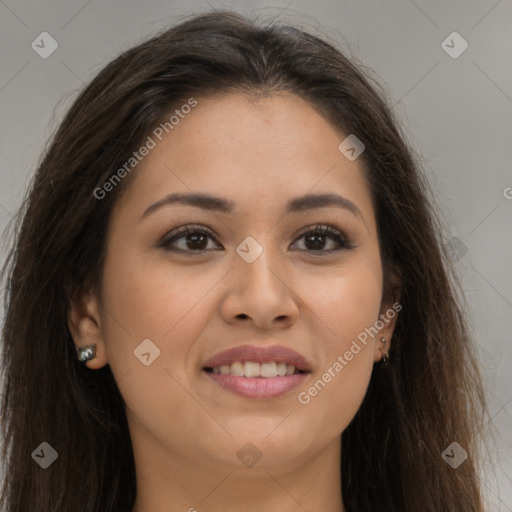 Joyful latino young-adult female with long  brown hair and brown eyes