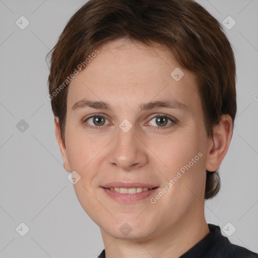 Joyful white young-adult female with short  brown hair and brown eyes