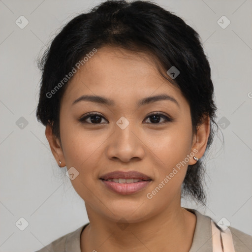 Joyful latino young-adult female with short  black hair and brown eyes