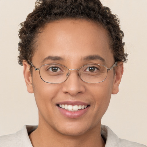 Joyful white adult female with short  brown hair and brown eyes