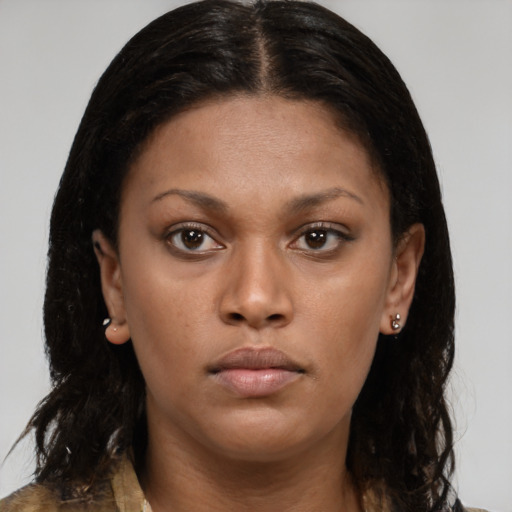 Neutral black young-adult female with long  brown hair and brown eyes