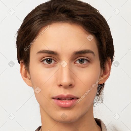 Neutral white young-adult female with short  brown hair and brown eyes