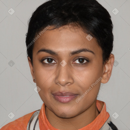 Joyful latino young-adult female with short  black hair and brown eyes