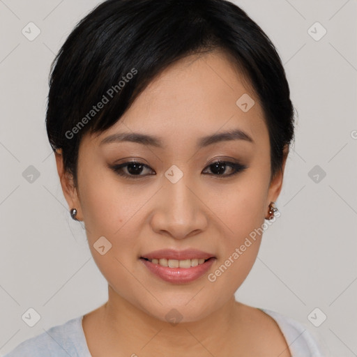 Joyful asian young-adult female with medium  black hair and brown eyes