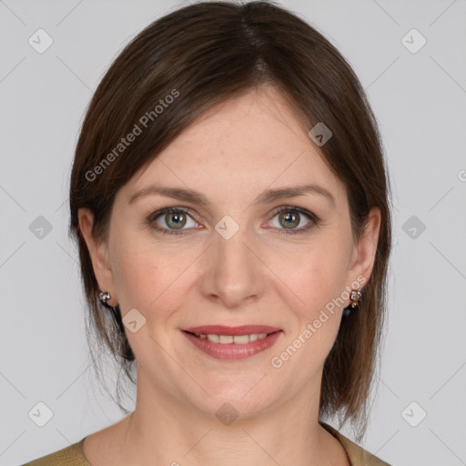 Joyful white young-adult female with medium  brown hair and grey eyes