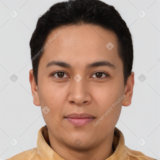 Joyful latino young-adult male with short  brown hair and brown eyes