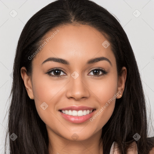 Joyful latino young-adult female with long  brown hair and brown eyes