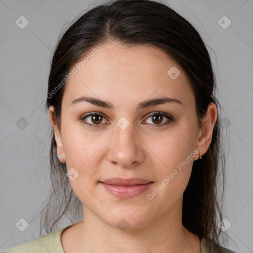 Joyful white young-adult female with medium  brown hair and brown eyes