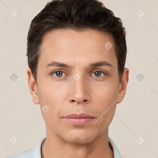 Neutral white young-adult male with short  brown hair and brown eyes