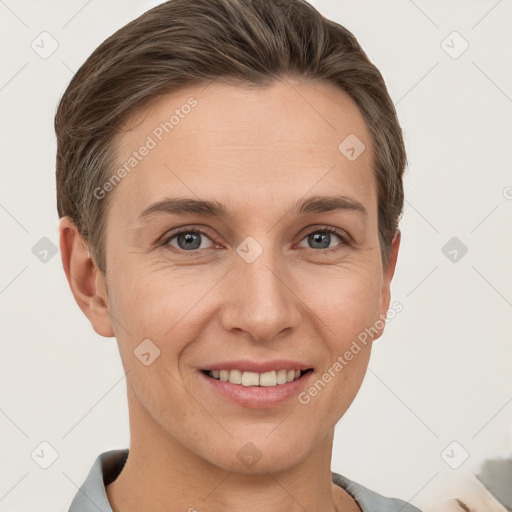 Joyful white young-adult female with short  brown hair and grey eyes