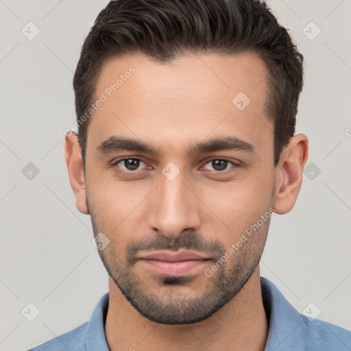 Neutral white young-adult male with short  brown hair and brown eyes