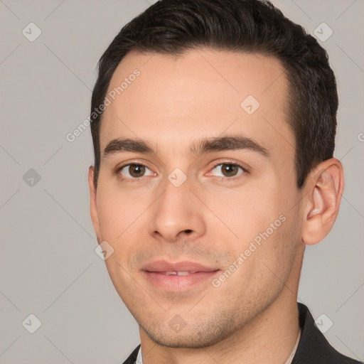 Joyful white young-adult male with short  brown hair and brown eyes