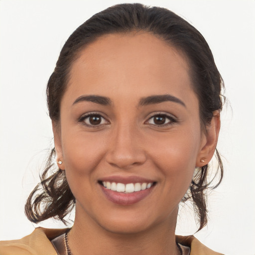 Joyful white young-adult female with medium  brown hair and brown eyes