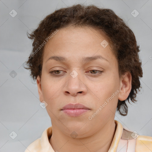 Joyful white adult female with short  brown hair and brown eyes