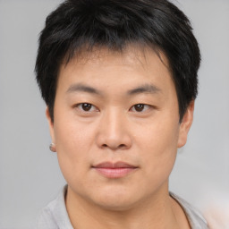 Neutral asian young-adult male with short  brown hair and brown eyes