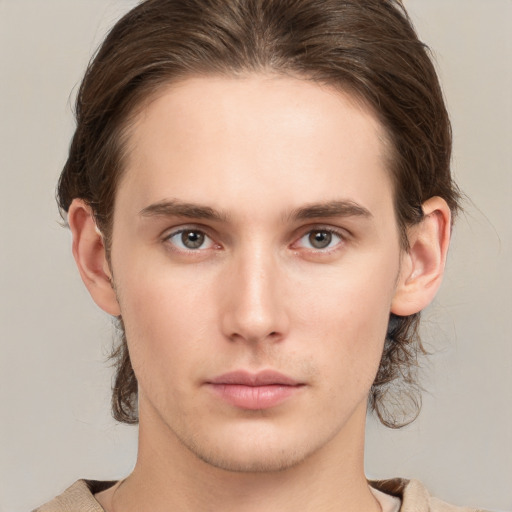 Neutral white young-adult male with medium  brown hair and grey eyes