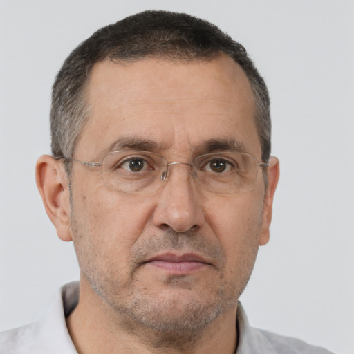 Neutral white middle-aged male with short  brown hair and brown eyes