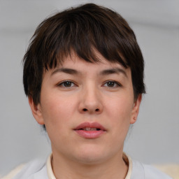 Neutral white young-adult female with short  brown hair and brown eyes