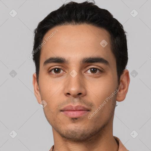 Neutral latino young-adult male with short  black hair and brown eyes