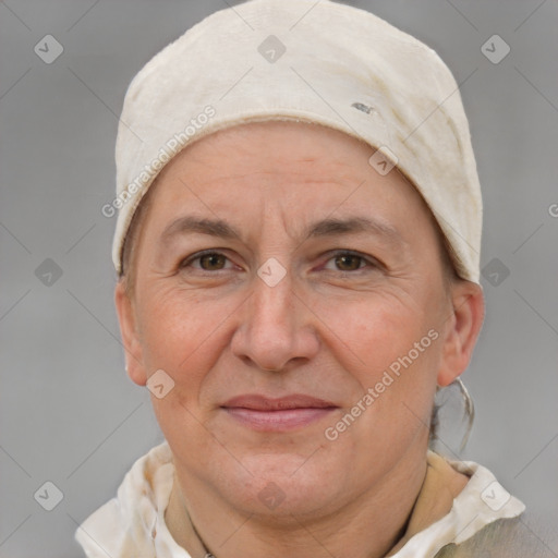 Joyful white adult female with short  brown hair and brown eyes