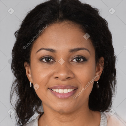 Joyful black young-adult female with medium  brown hair and brown eyes