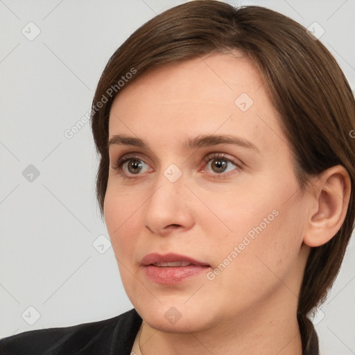 Neutral white young-adult female with medium  brown hair and brown eyes