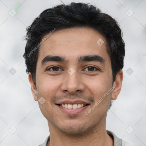 Joyful white young-adult male with short  black hair and brown eyes