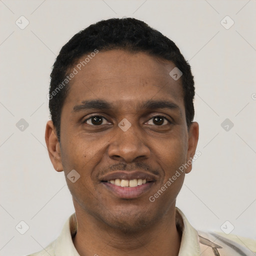 Joyful black young-adult male with short  black hair and brown eyes