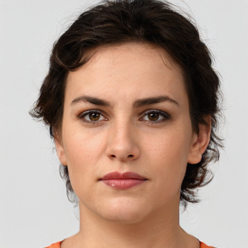 Neutral white young-adult female with medium  brown hair and brown eyes