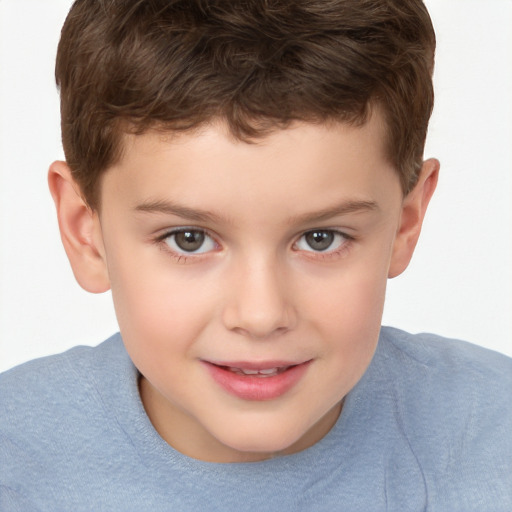 Joyful white child male with short  brown hair and brown eyes