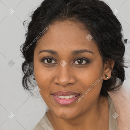 Joyful black young-adult female with long  brown hair and brown eyes