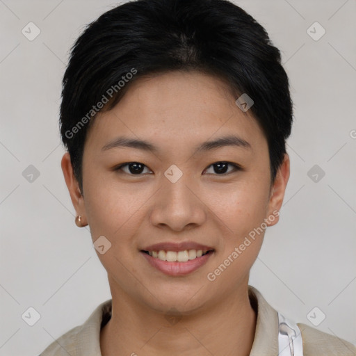 Joyful asian young-adult female with short  black hair and brown eyes