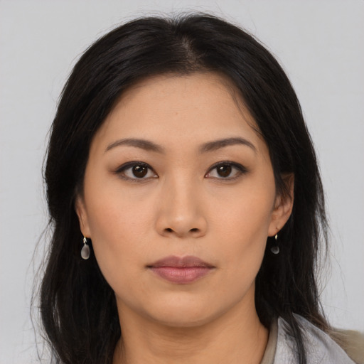 Neutral asian young-adult female with long  brown hair and brown eyes