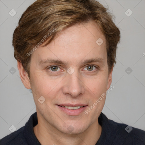 Joyful white adult male with short  brown hair and grey eyes