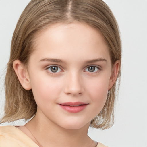 Joyful white child female with medium  brown hair and grey eyes