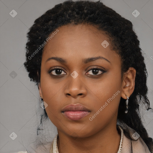 Neutral black young-adult female with long  black hair and brown eyes